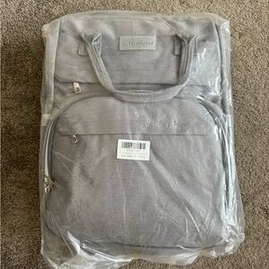 New in packaging! Diaper bag with changing station and straps!